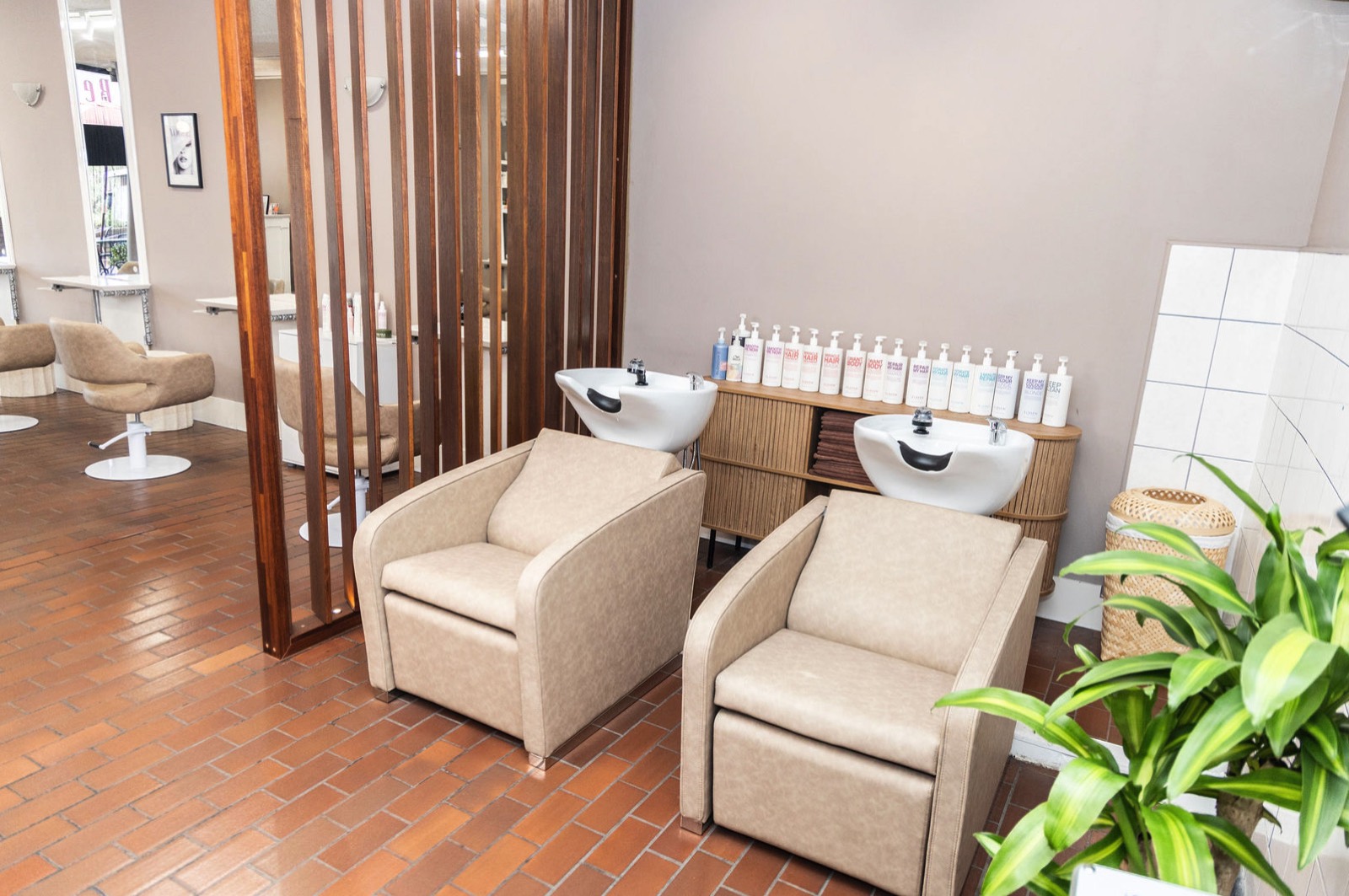 Wash and treatment lounge at IKORA Hair